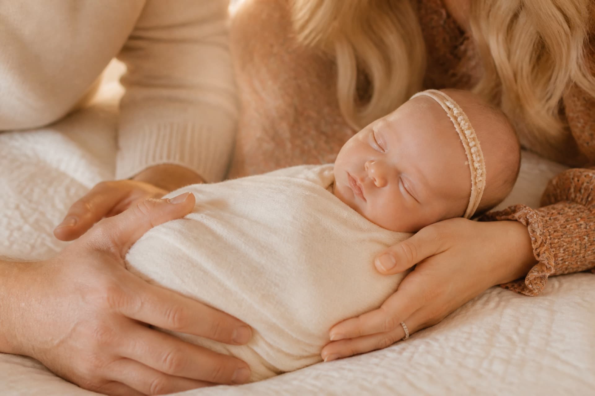 A newborn during a soft indoor portrait session in Utah